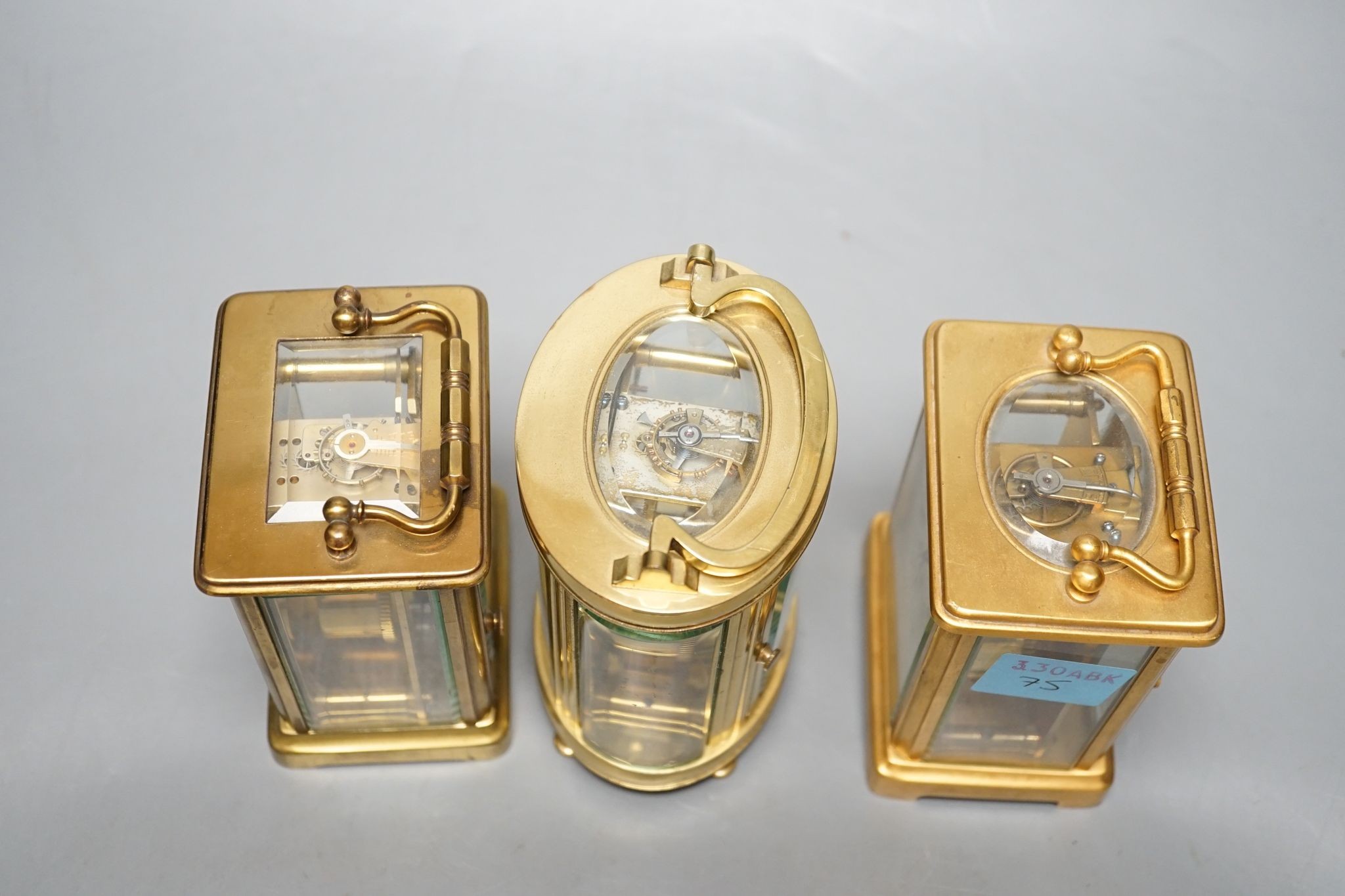 Three carriage timepieces, tallest 12 cm
